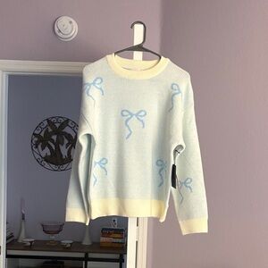 Iris Light Blue and Cream Bow Sweater